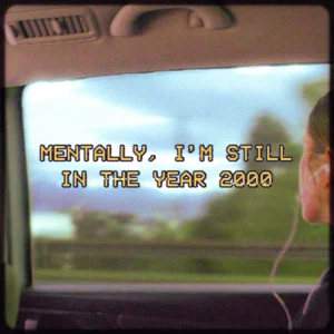 In the back seat pretending I'm in a music video