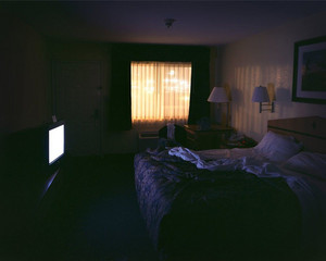 In bed, staring at the ceiling 